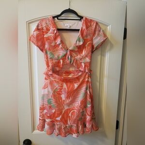 GB tropical dress with a cut out